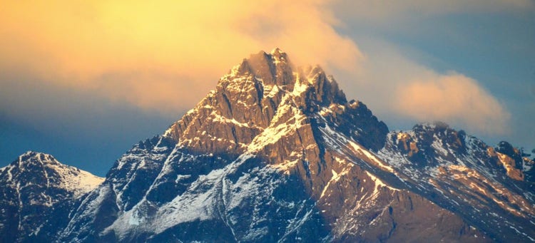 mountain peak to symbolise the interest rate continuing to peak.