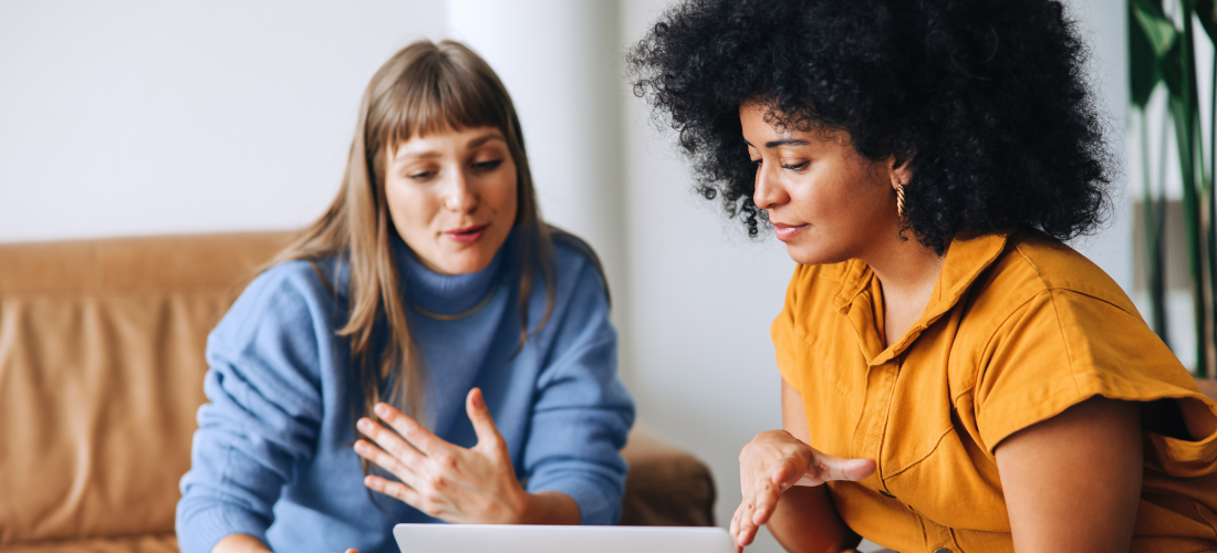 two women discussing the change in hours worked